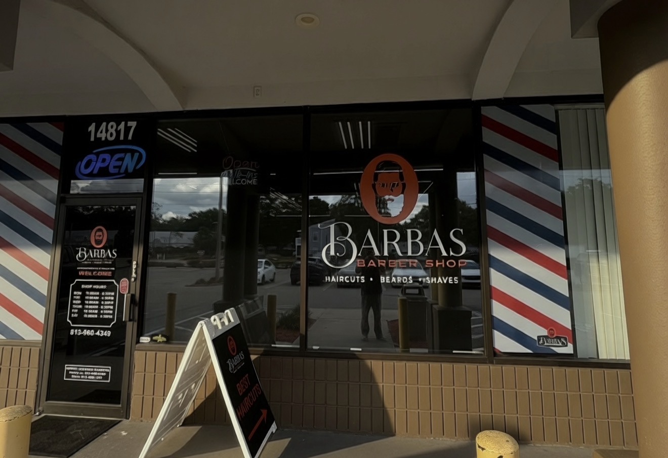 Barbas Barbershop.